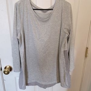 This gray and striped blouse great for causal wear